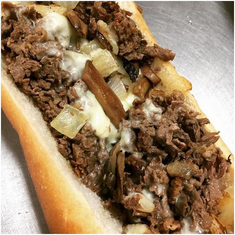 Cheesesteak with fried onions and mushroom